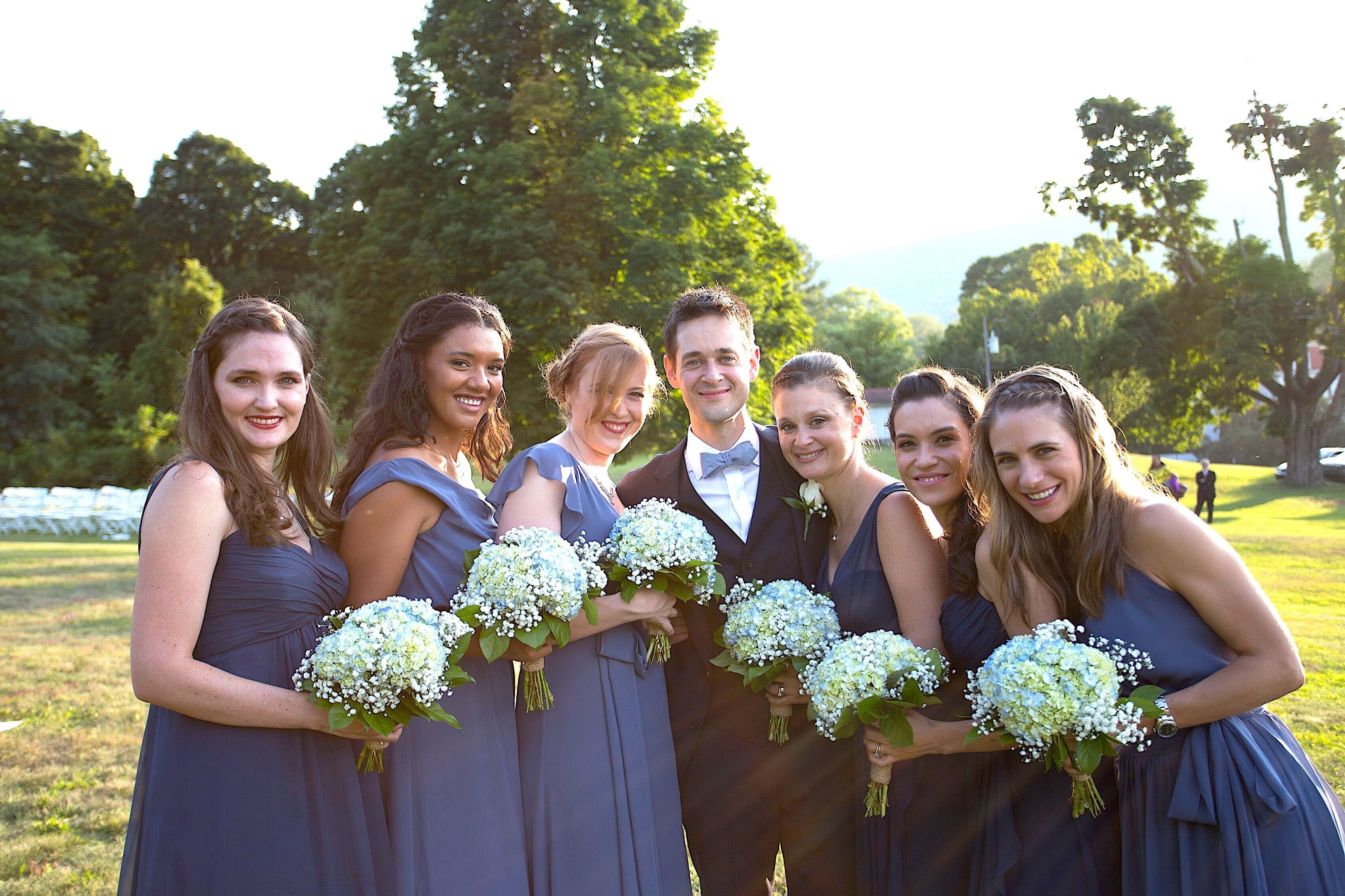 Groom with bridesmaids.