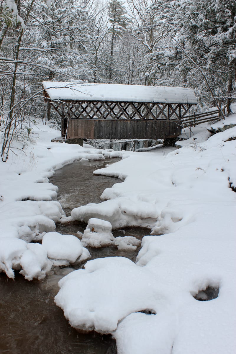 Artists Falls and covered bridge in winter.